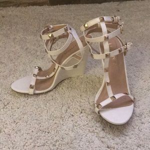 Strapped white wedge shoe